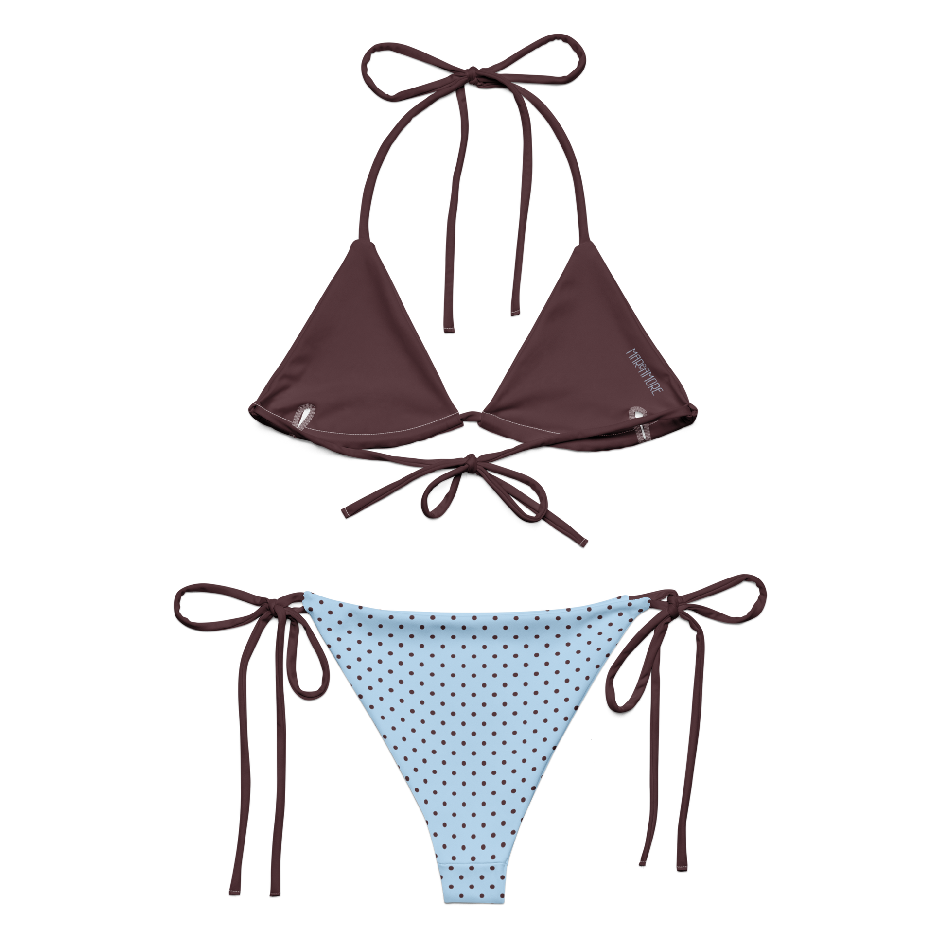 Brown triangle bikini top and blue polka dot bikini bottom on a white background