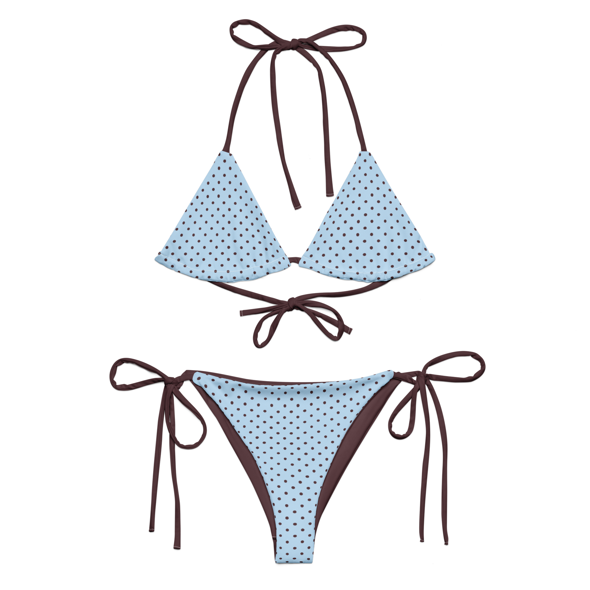 Blue polka dot bikini with brown straps on a white background