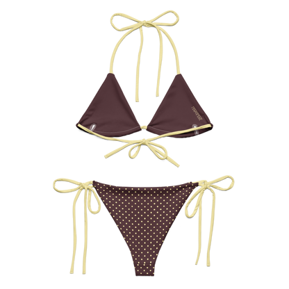 Brown bikini set with polka dot pattern and yellow straps on a white background