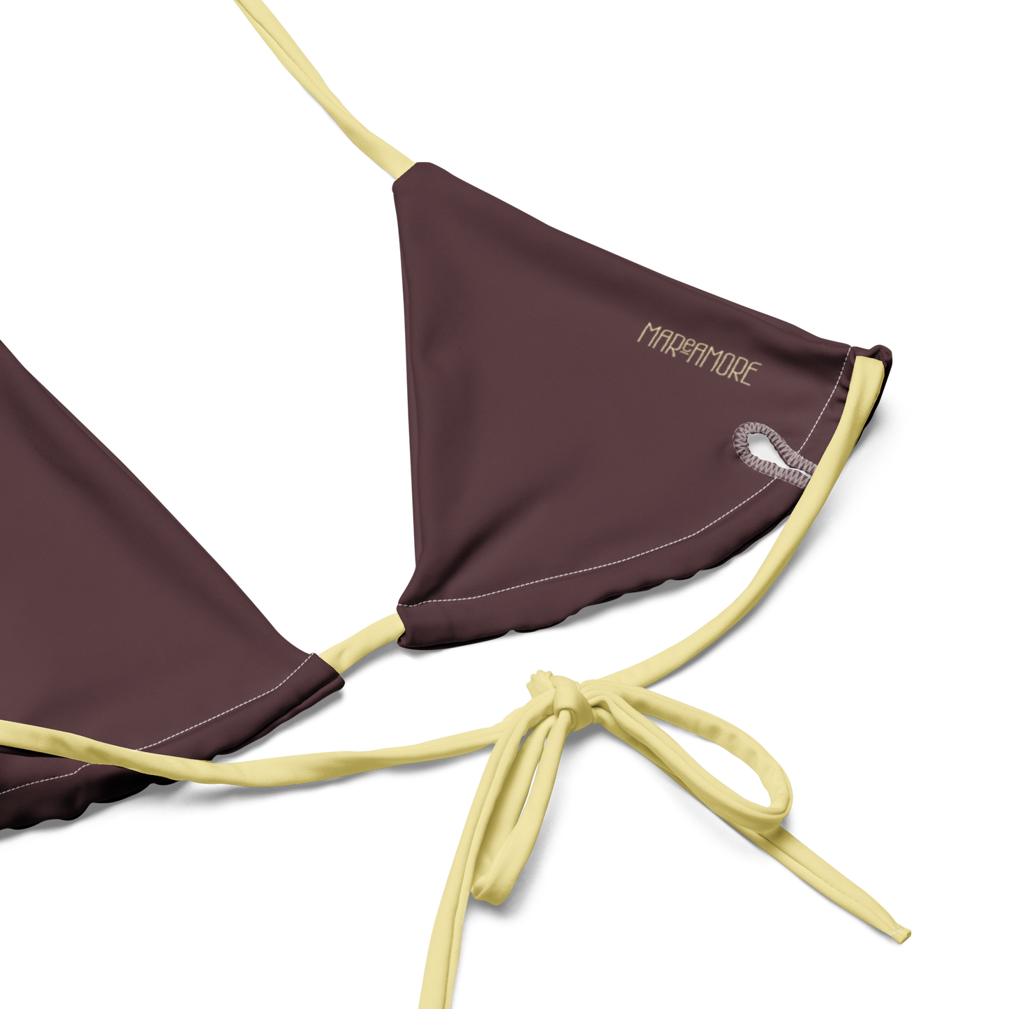 Brown bikini top lining with yellow straps on a white background