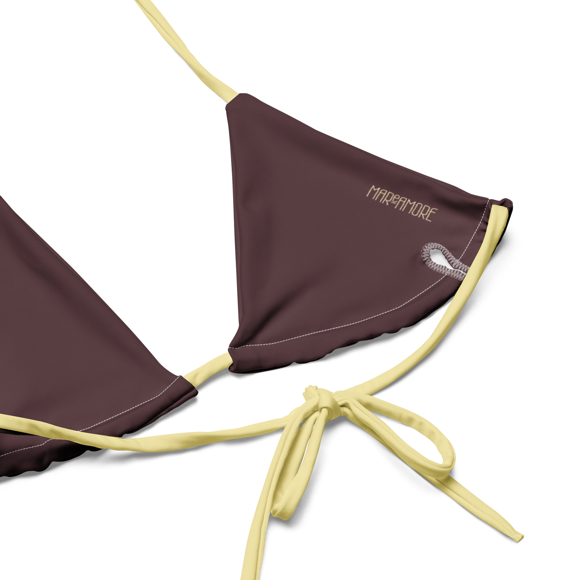 Brown bikini top lining with yellow straps on a white background