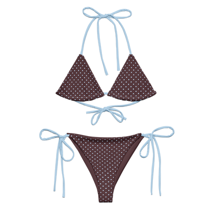 Brown polka dot bikini with blue strings on a white background