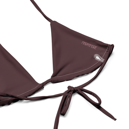 Pink bikini top with brown lining and straps on a white background, product logo detail